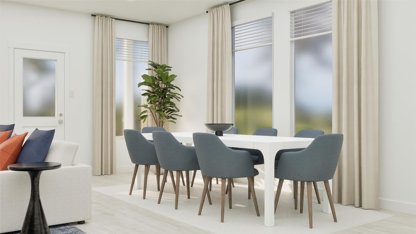13316 Winton Drive Elgin, TX 78621 - Photo 15 of 35 a view of a dining room with furniture and wooden floor