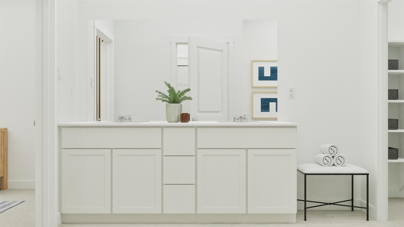 13316 Winton Drive Elgin, TX 78621 - Photo 29 of 35 a bathroom with a sink and mirror