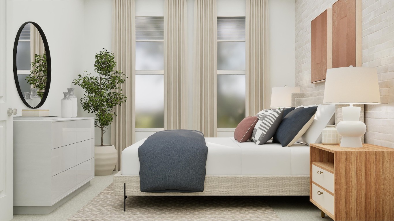 13316 Winton Drive Elgin, TX 78621 - Photo 6 of 35 a bedroom with a bed and a potted plant next to a window