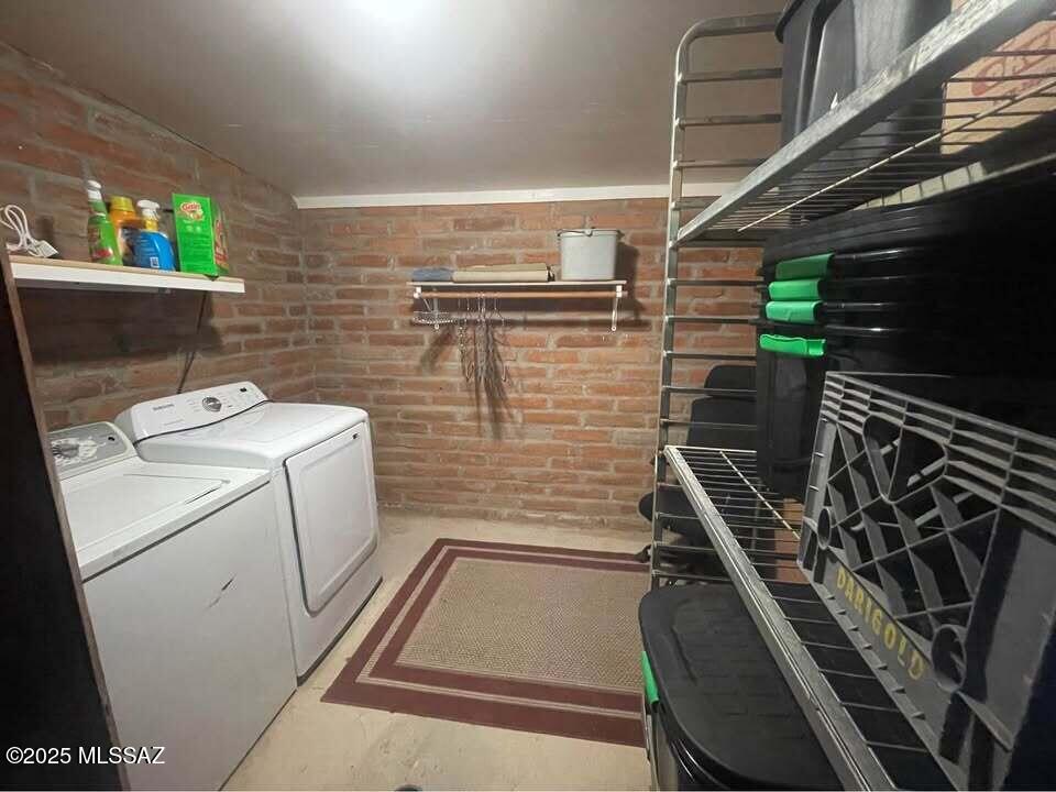 1094 North Pomerene Road Benson, AZ 85602 - Photo 13 of 48 a storage room with washer and dryer