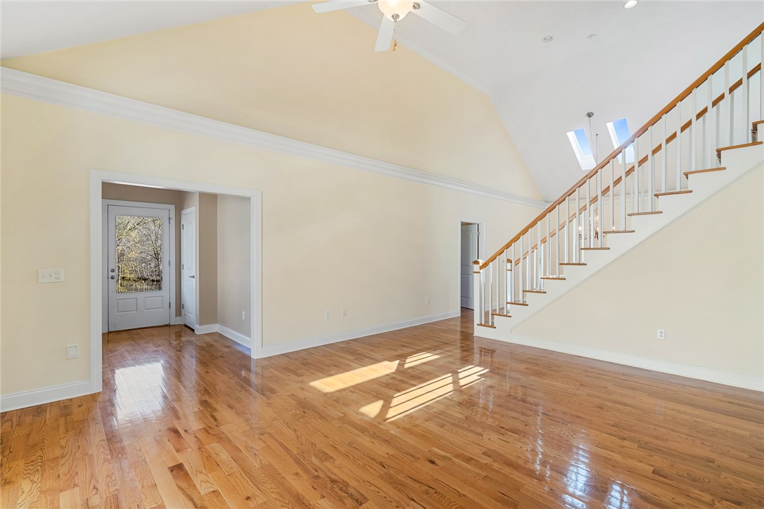 16 Oleander Drive Anderson, SC 29621 - Photo 8 of 37 Vast, open living space with soaring ceilings and rich hardwood floors invites a sense of grandeur.