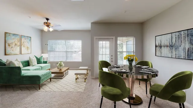 a living room with furniture a window and a chandelier