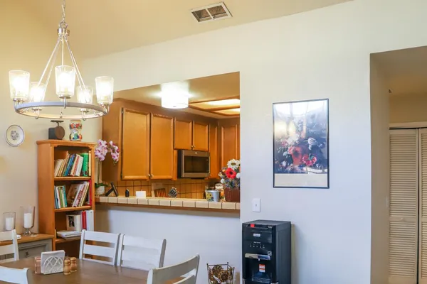 a kitchen with stainless steel appliances a refrigerator and a sink