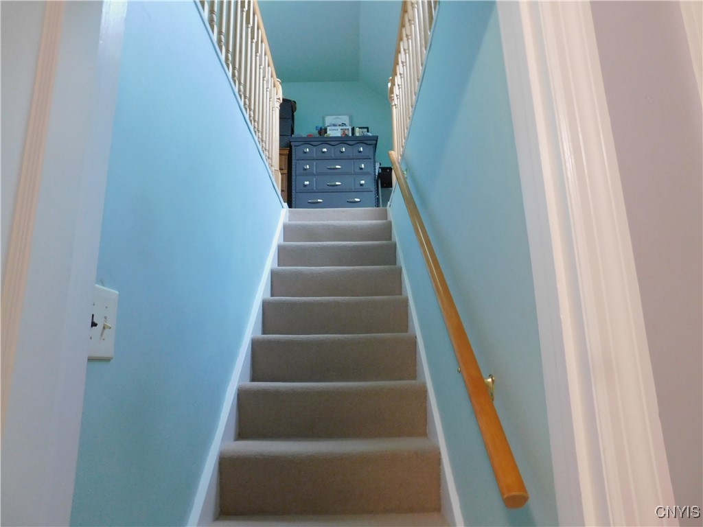 517 Coolidge Road Utica, NY 13502 - Photo 5 of 33 Stairs leading to upstairs bedroom