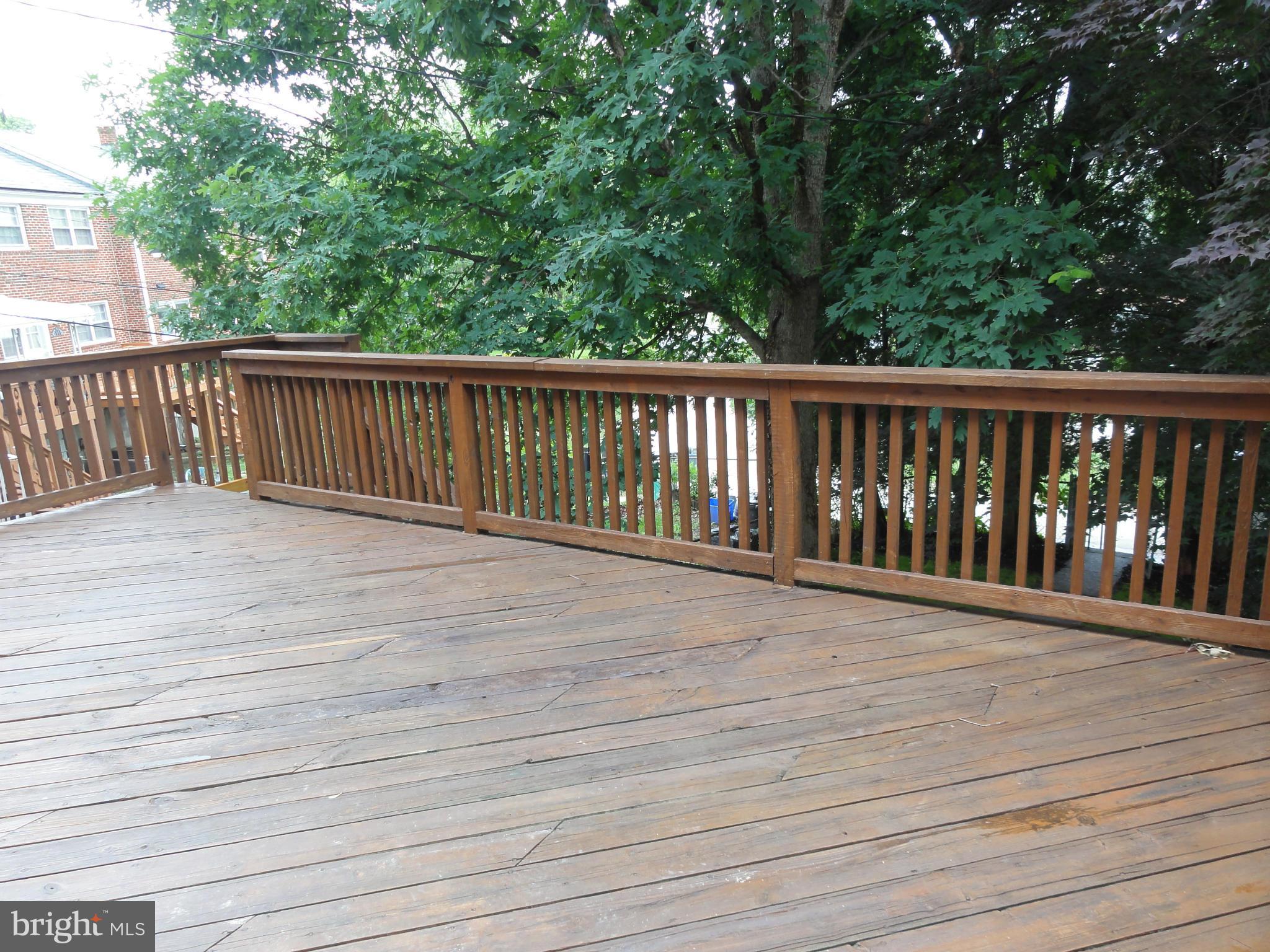 1105 Newfield Road Baltimore, MD 21207 - Photo 11 of 27 Huge rear deck off kitchen