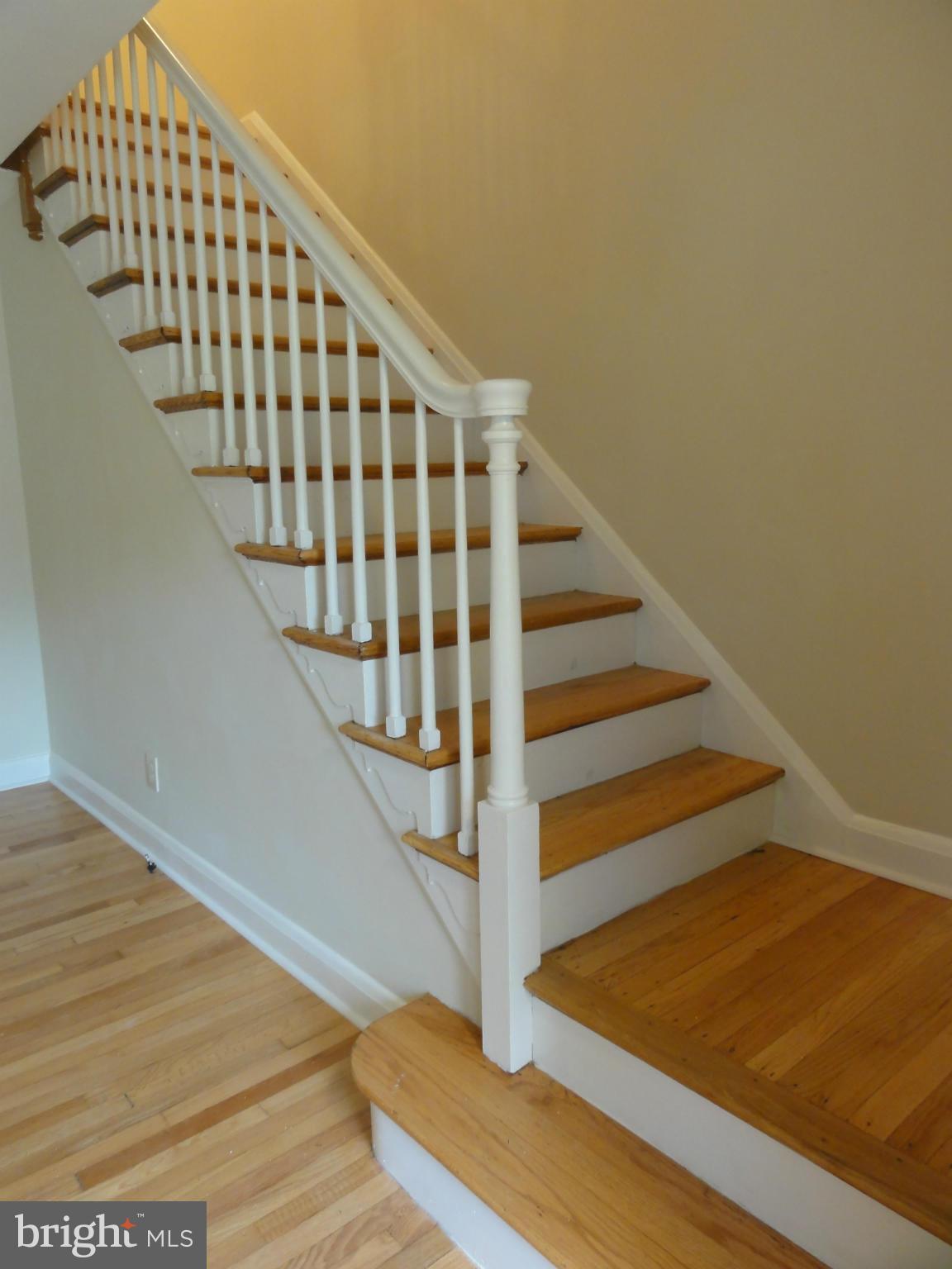 1105 Newfield Road Baltimore, MD 21207 - Photo 12 of 27 Hardwood staircase