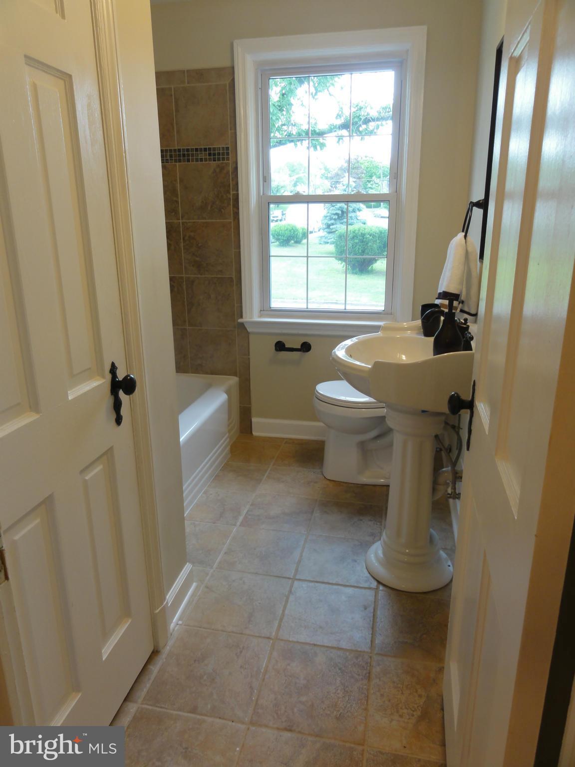 1105 Newfield Road Baltimore, MD 21207 - Photo 16 of 27 Upper level bath with large linen closet