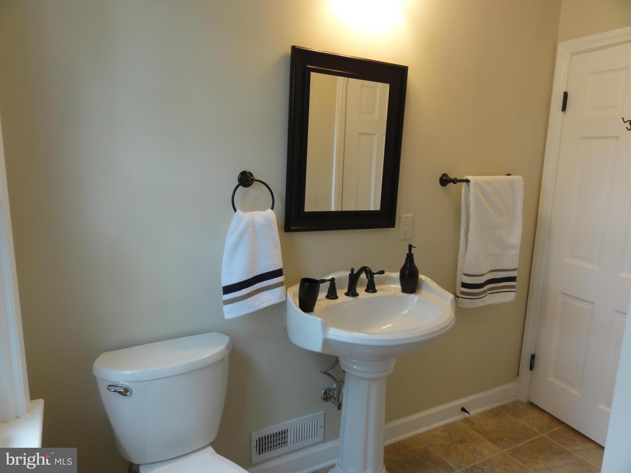 1105 Newfield Road Baltimore, MD 21207 - Photo 17 of 27 Upper level bath