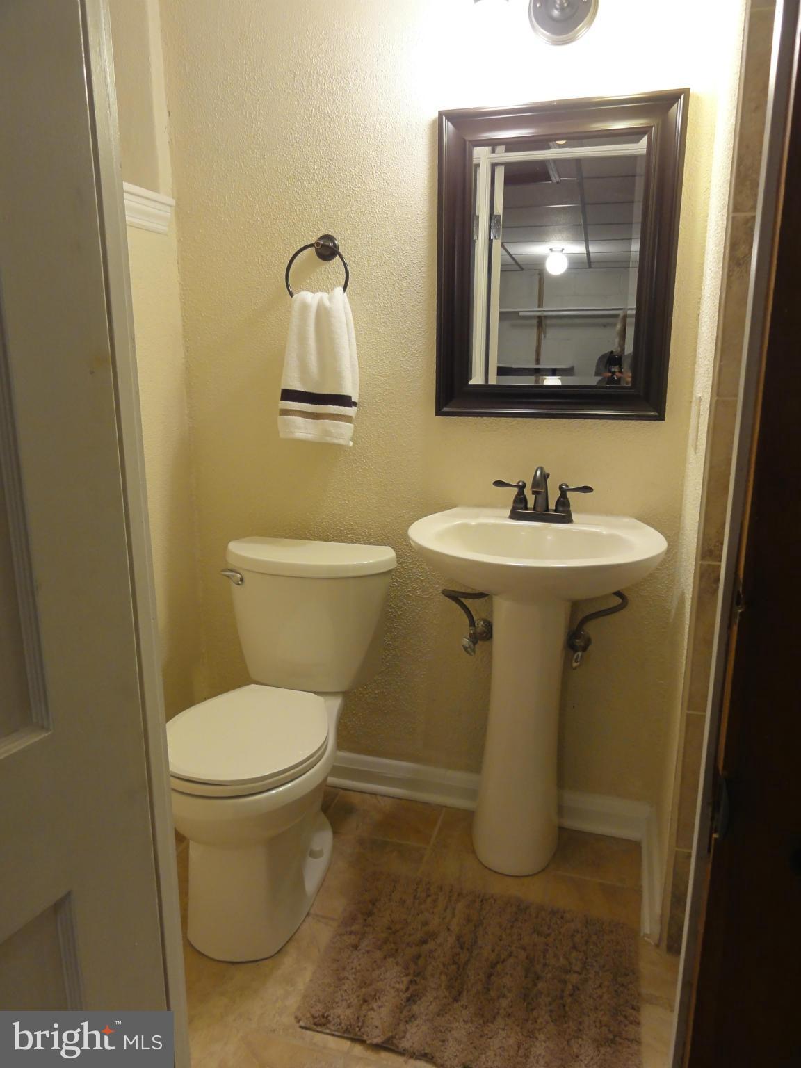 1105 Newfield Road Baltimore, MD 21207 - Photo 22 of 27 Convenient lower level full bath