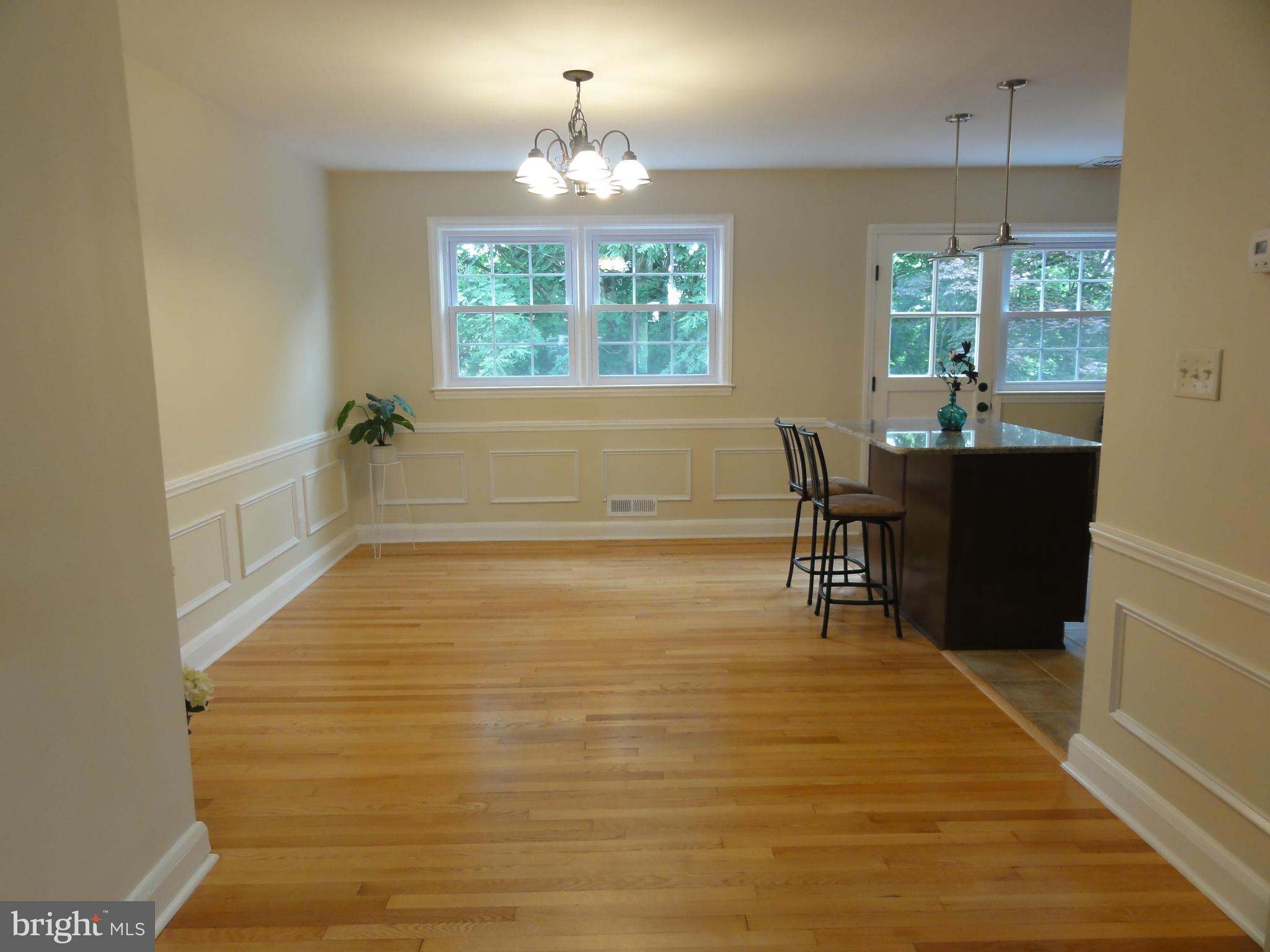 1105 Newfield Road Baltimore, MD 21207 - Photo 5 of 27 Dining area with decorative picture framing