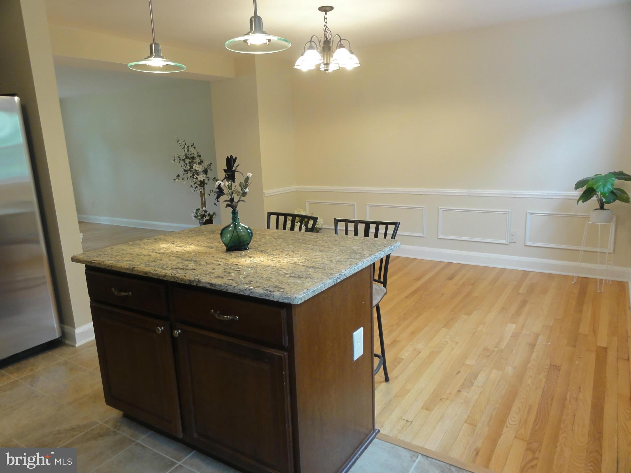 1105 Newfield Road Baltimore, MD 21207 - Photo 9 of 27 Island with breakfast bar