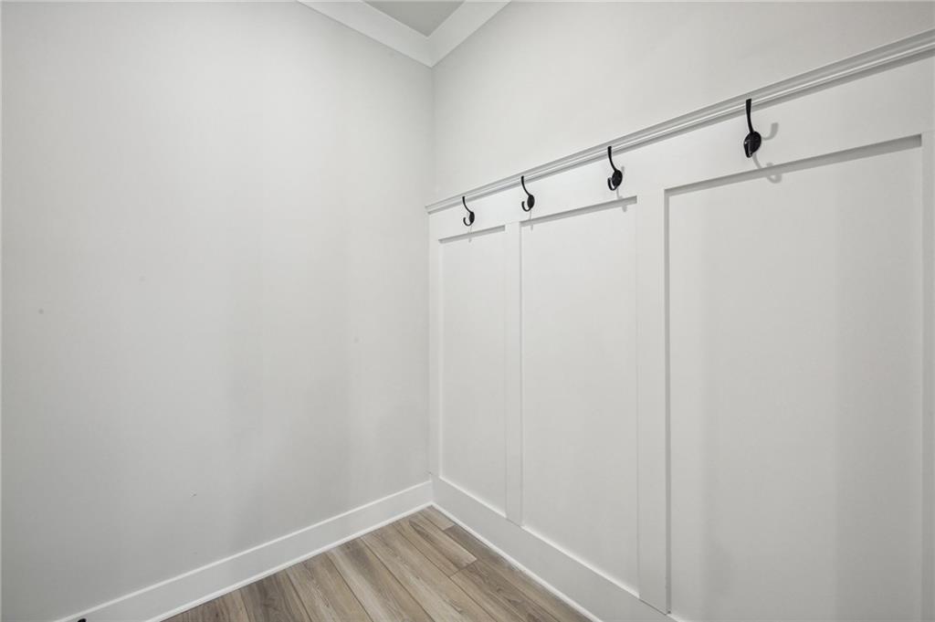 369 Scarlet Rose Way Hoschton, GA 30548 - Photo 34 of 150 a view of small space with racks on the wall