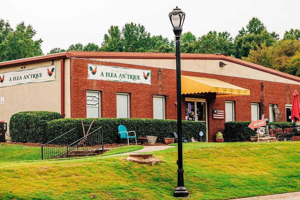 369 Scarlet Rose Way Hoschton, GA 30548 - Photo 80 of 150 a view of a house with swimming pool and a yard