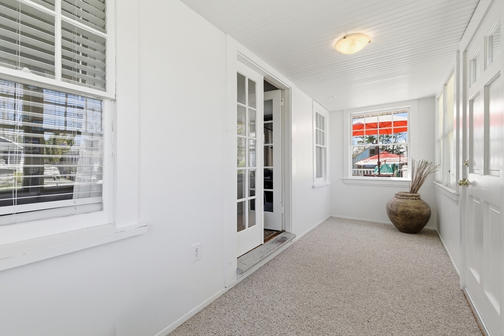 6 Birch Street Wareham, MA 02571 - Photo 11 of 25 a view of an empty room with a window and storage