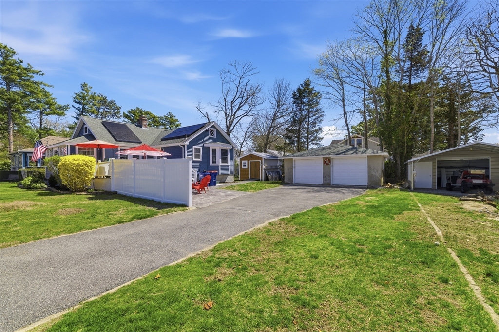 6 Birch Street Wareham, MA 02571 - Photo 20 of 25 a front view of a house with garden