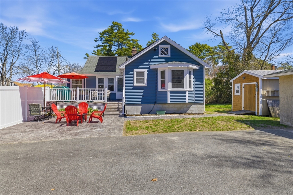 6 Birch Street Wareham, MA 02571 - Photo 2 of 25 a front view of a house with garden