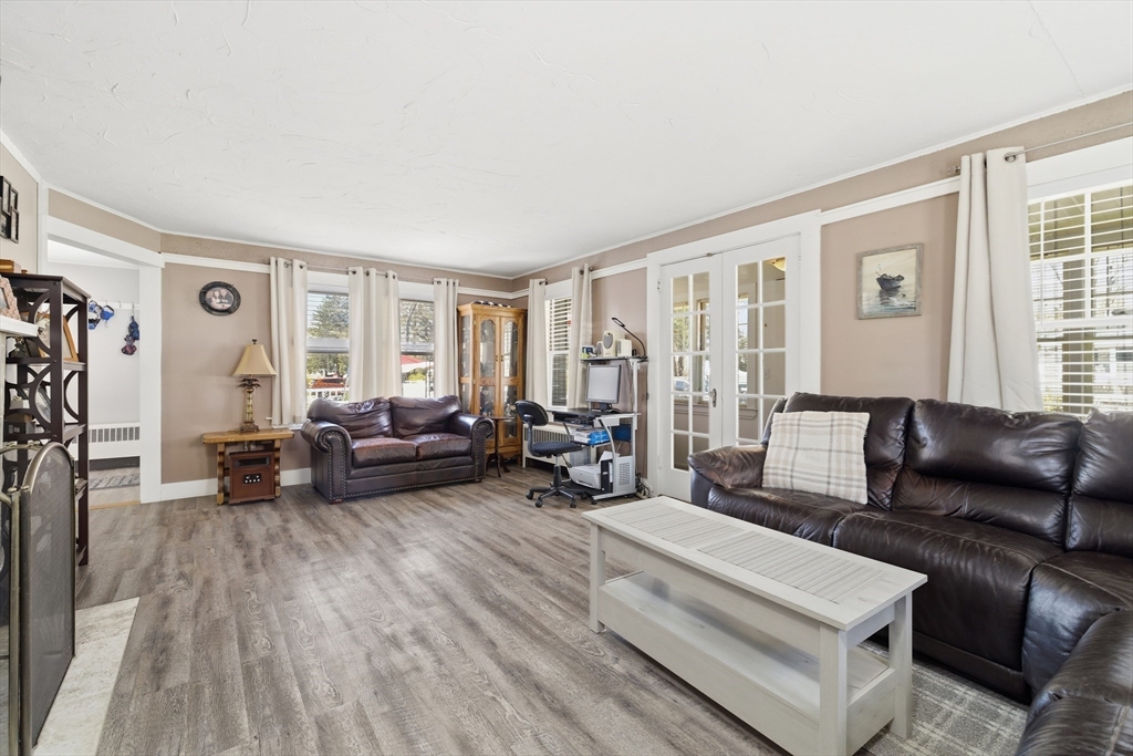 6 Birch Street Wareham, MA 02571 - Photo 10 of 25 a living room with furniture and a large window