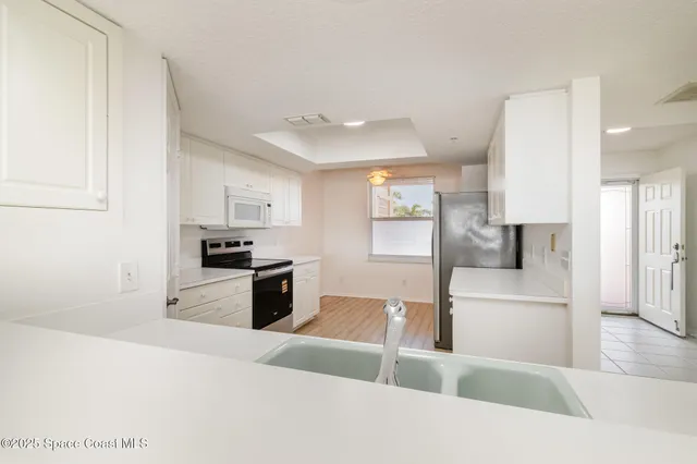 a bathroom with a bathtub and toilet