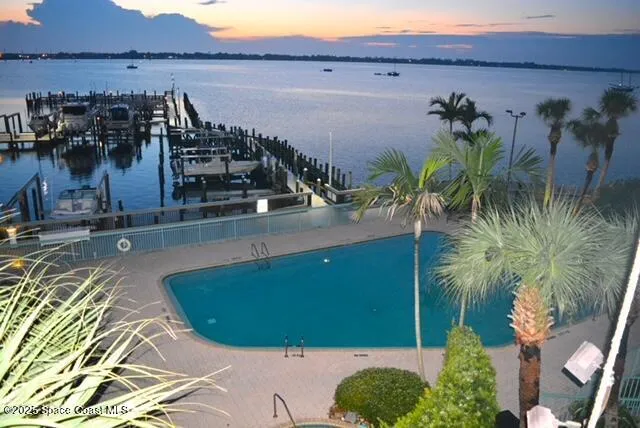 a view of a room with floor to ceiling windows