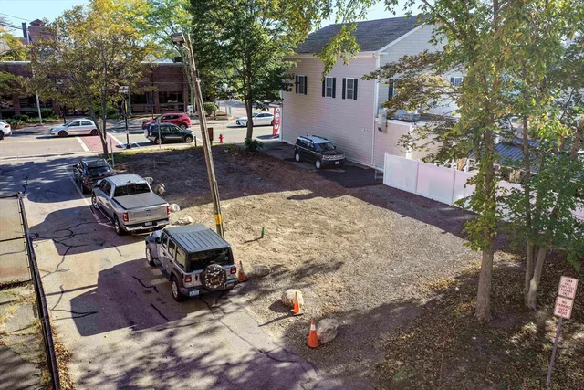 a view of a backyard with sitting area