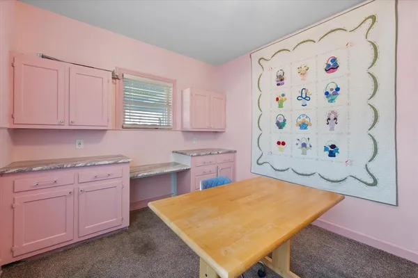 a bathroom with a bathtub and toilet