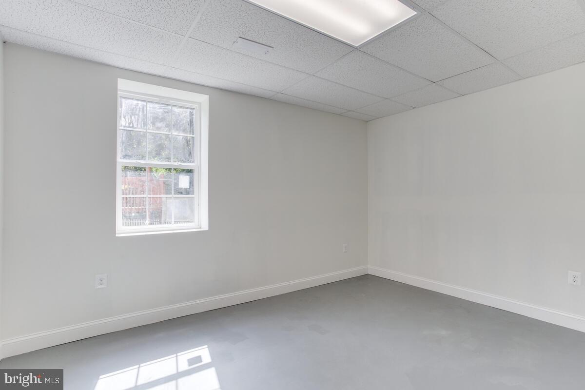 4425 Solomons Island Road Huntingtown, MD 20639 - Photo 58 of 65 an empty room with a window