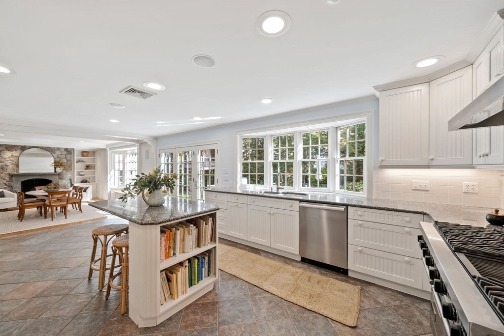 56 Ledgeways Wellesley, MA 02481 - Photo 15 of 42 a living room with furniture and a large window