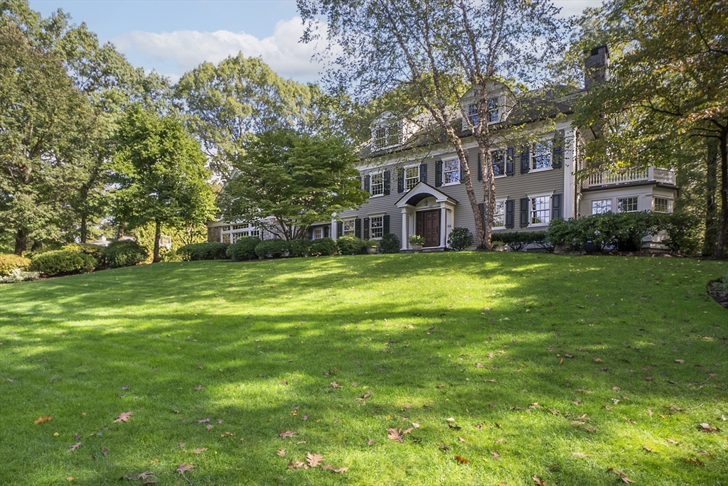 56 Ledgeways Wellesley, MA 02481 - Photo 2 of 42 a front view of a house with a garden