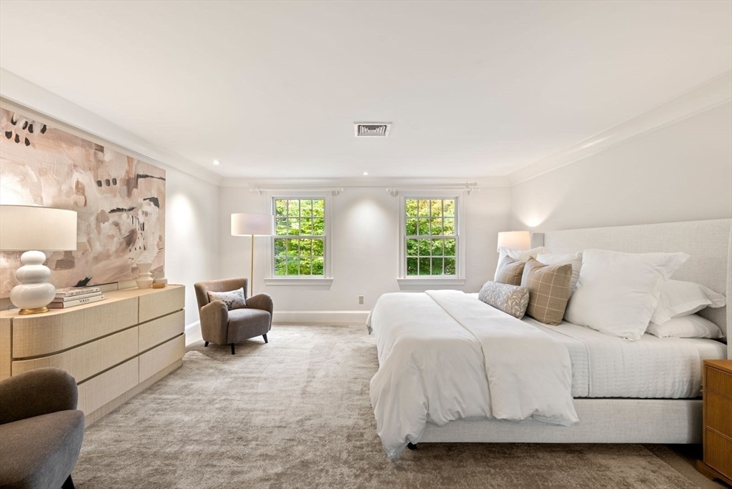 56 Ledgeways Wellesley, MA 02481 - Photo 25 of 42 a bed room with a bed and a couch