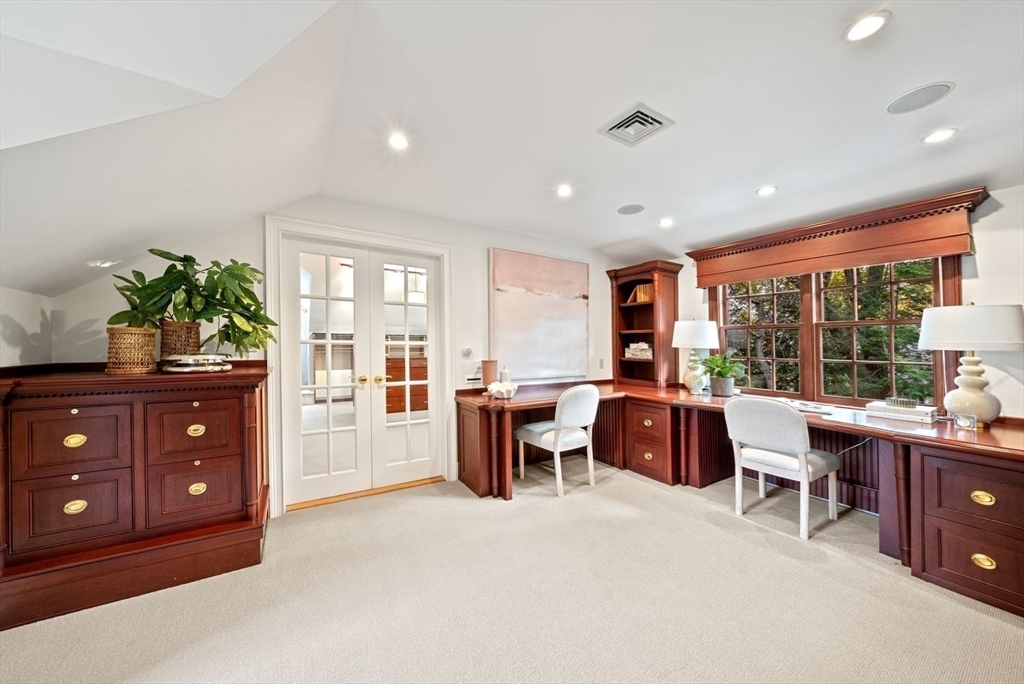 56 Ledgeways Wellesley, MA 02481 - Photo 28 of 42 a living room with furniture and a floor to ceiling window