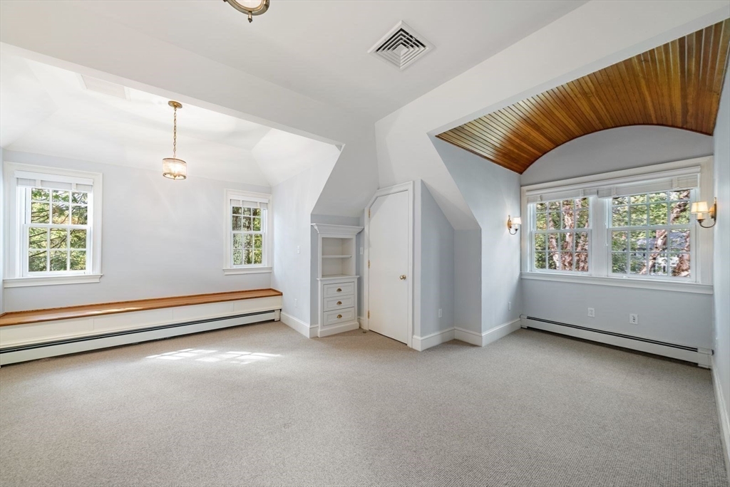 56 Ledgeways Wellesley, MA 02481 - Photo 32 of 42 a view of an empty room with a window