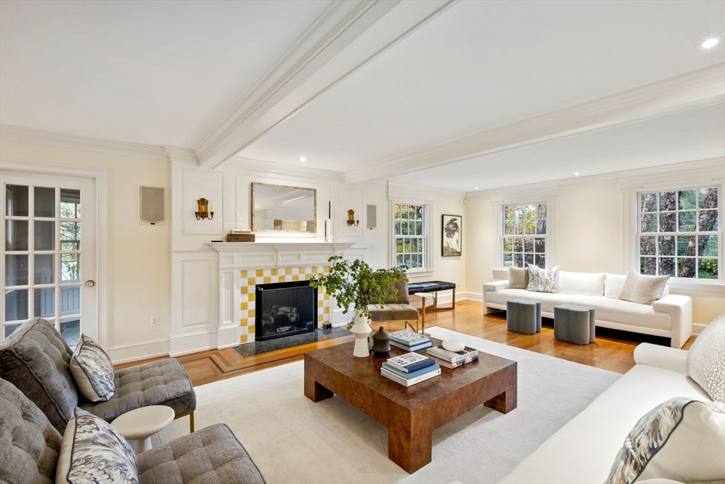 56 Ledgeways Wellesley, MA 02481 - Photo 8 of 42 a living room with furniture and a fireplace