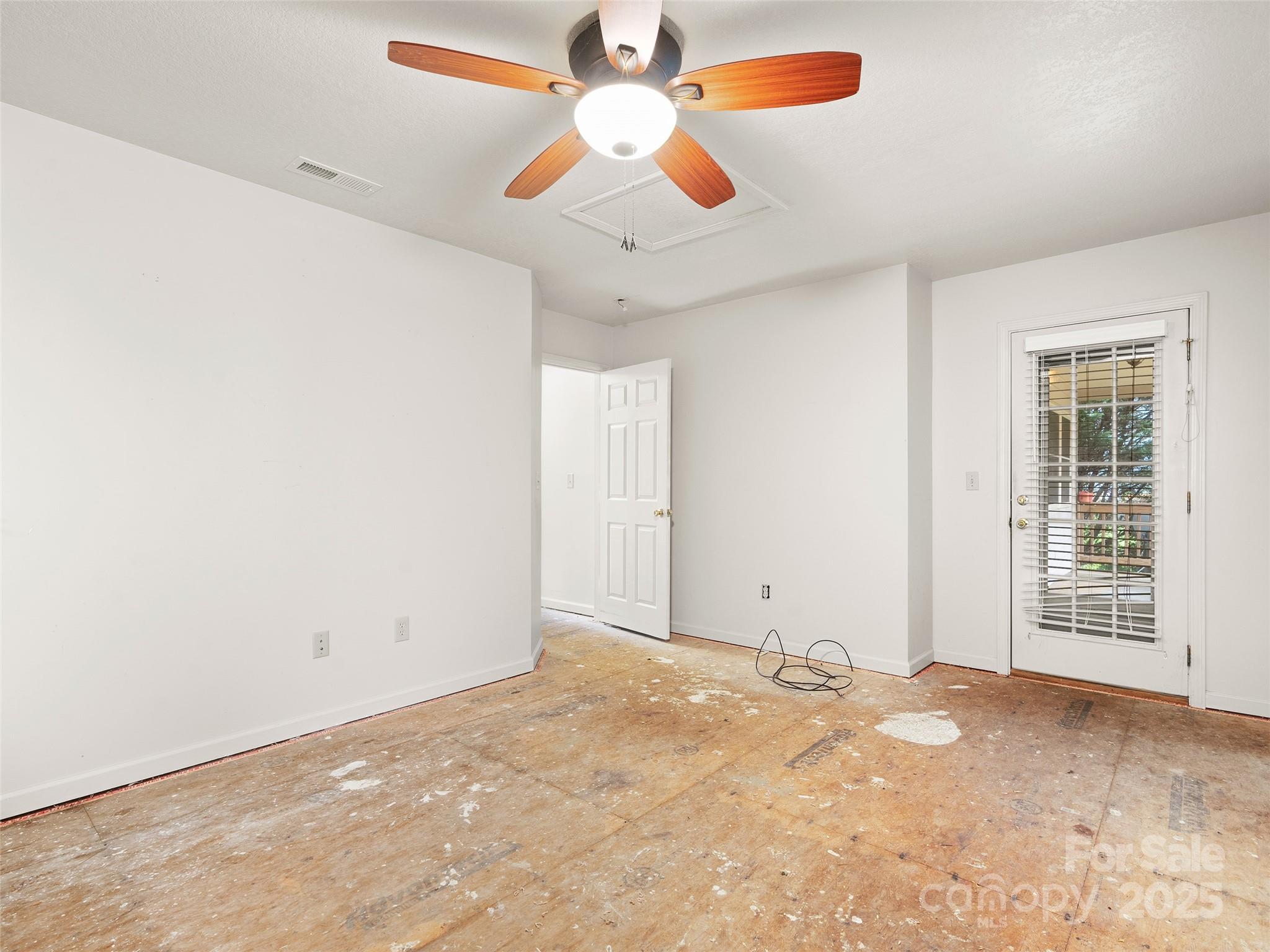 83 Indian Trace Road Maggie Valley, NC 28751 - Photo 15 of 21 a view of an empty room with window