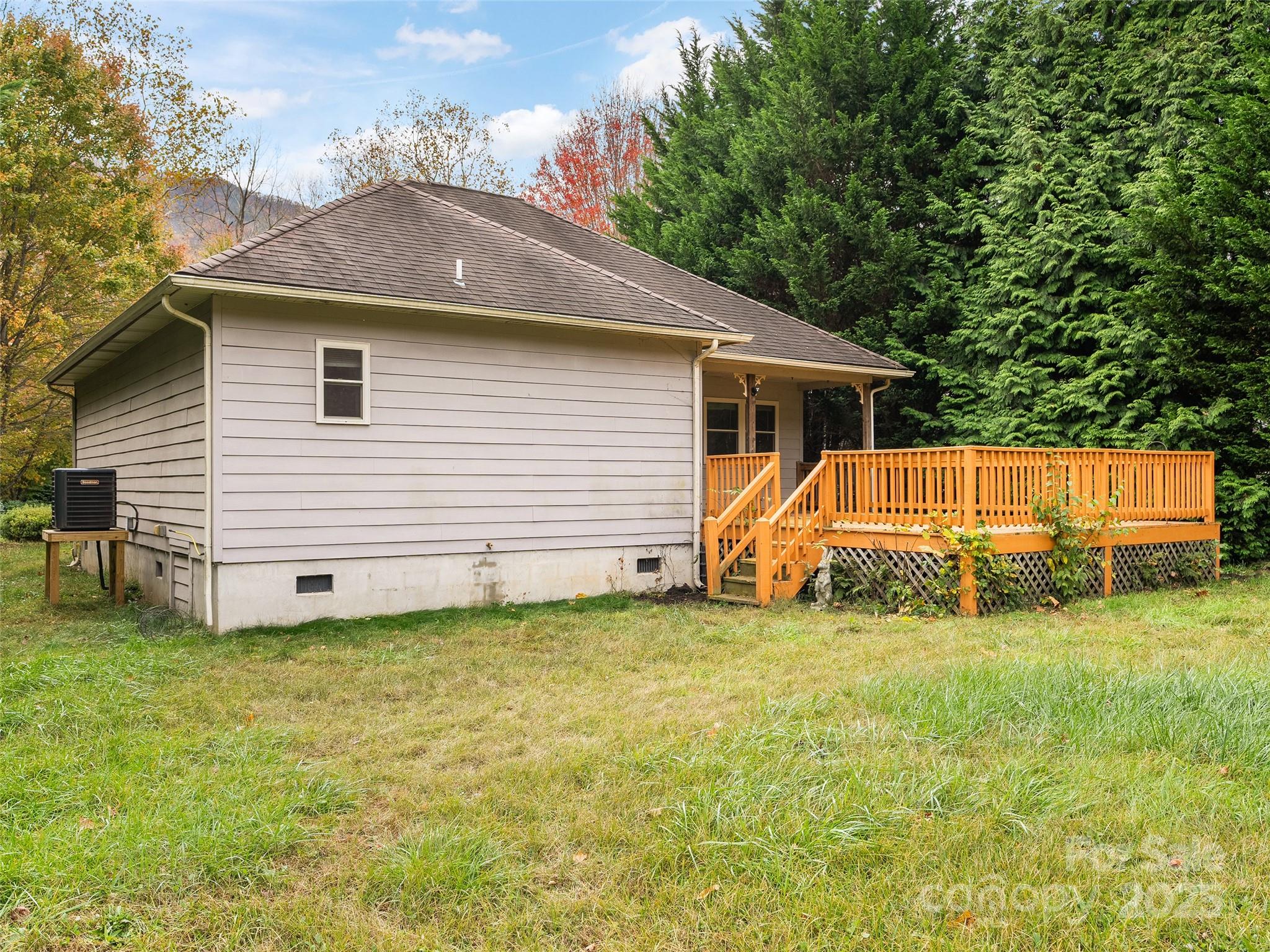 83 Indian Trace Road Maggie Valley, NC 28751 - Photo 20 of 21 a view of a house with a yard