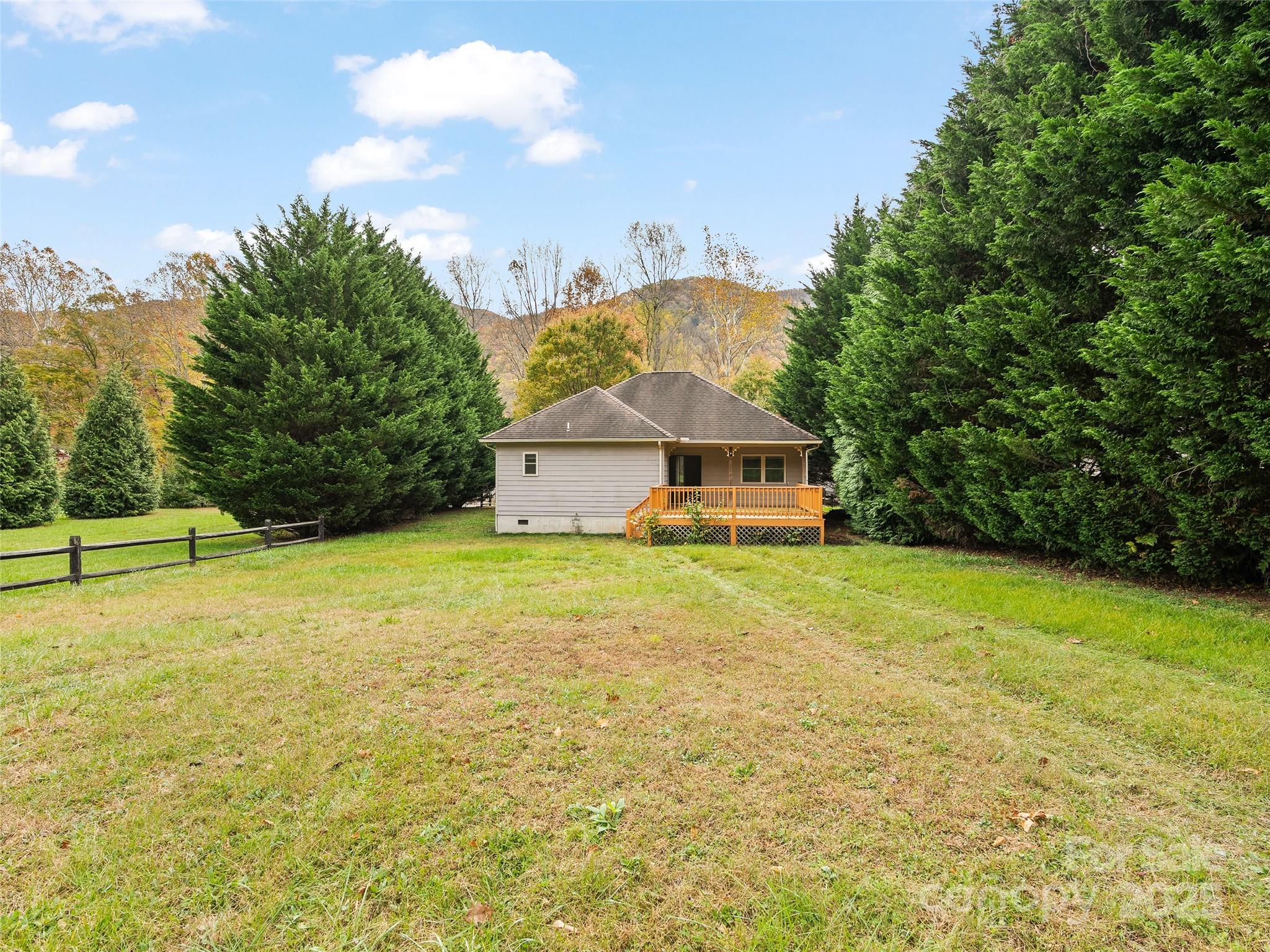 83 Indian Trace Road Maggie Valley, NC 28751 - Photo 21 of 21 a front view of a house with a yard