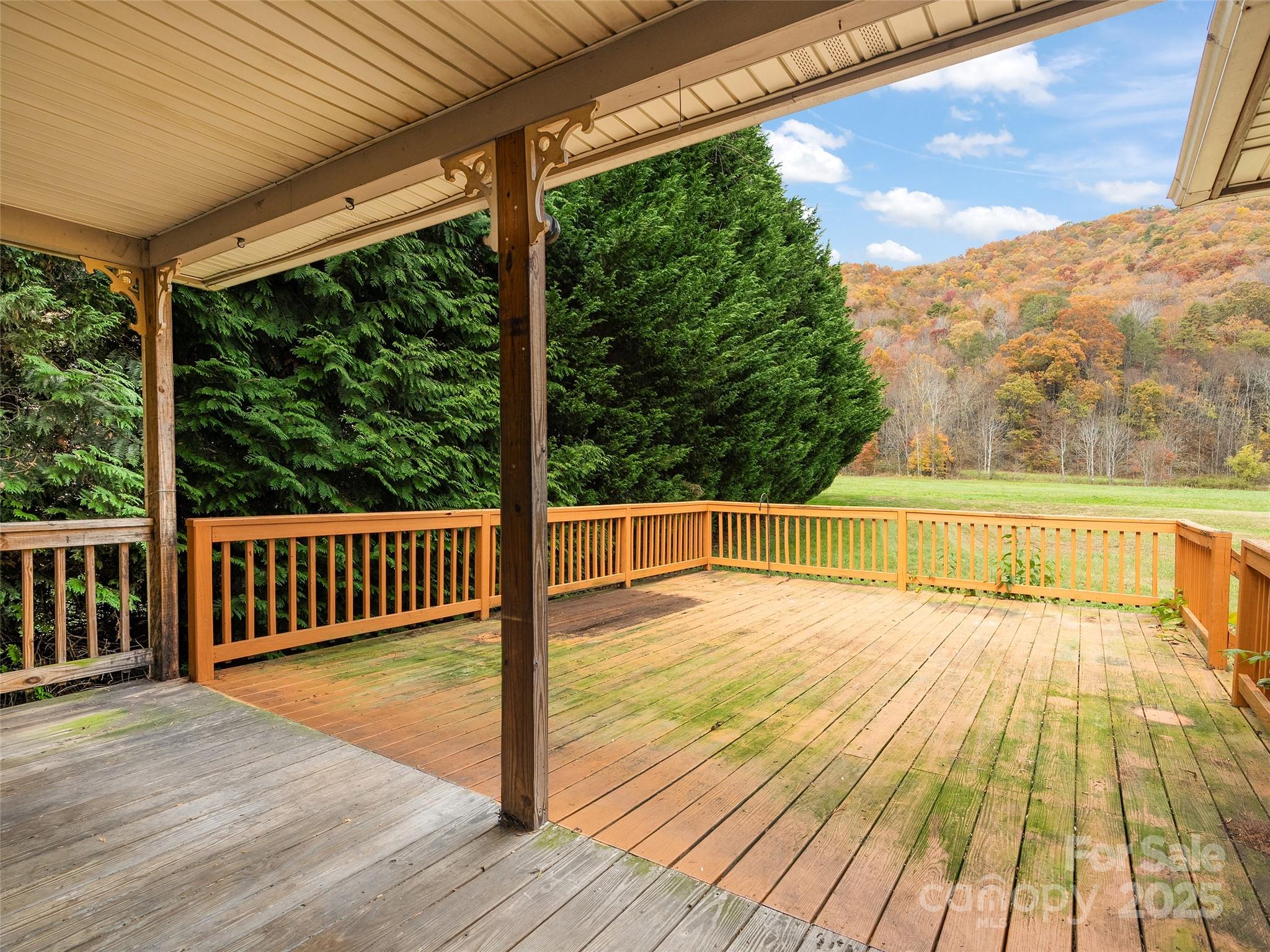 83 Indian Trace Road Maggie Valley, NC 28751 - Photo 7 of 21 a view of balcony with wooden floor