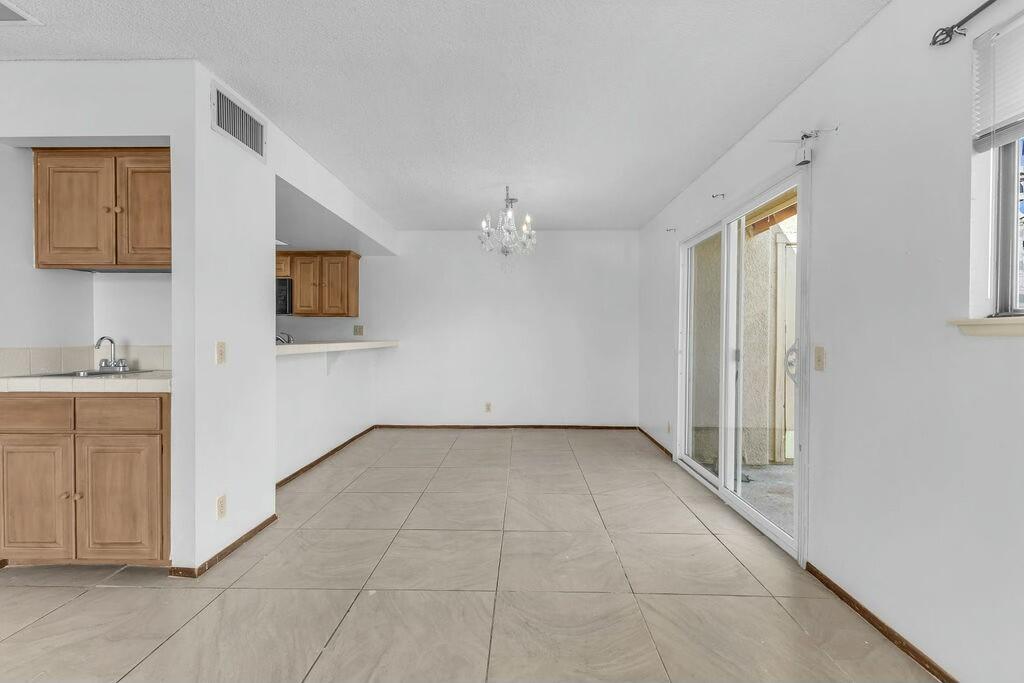 69527 Huerta Court Rancho Mirage, CA 92270 - Photo 4 of 22 a view of an empty room with a sink and a mirror