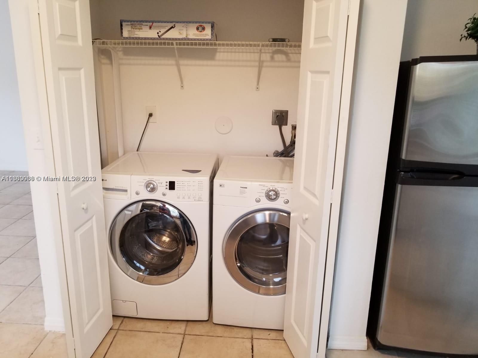 13622 Southwest 285th Terrace Homestead, FL 33033 - Photo 12 of 28 a utility room with dryer and washer