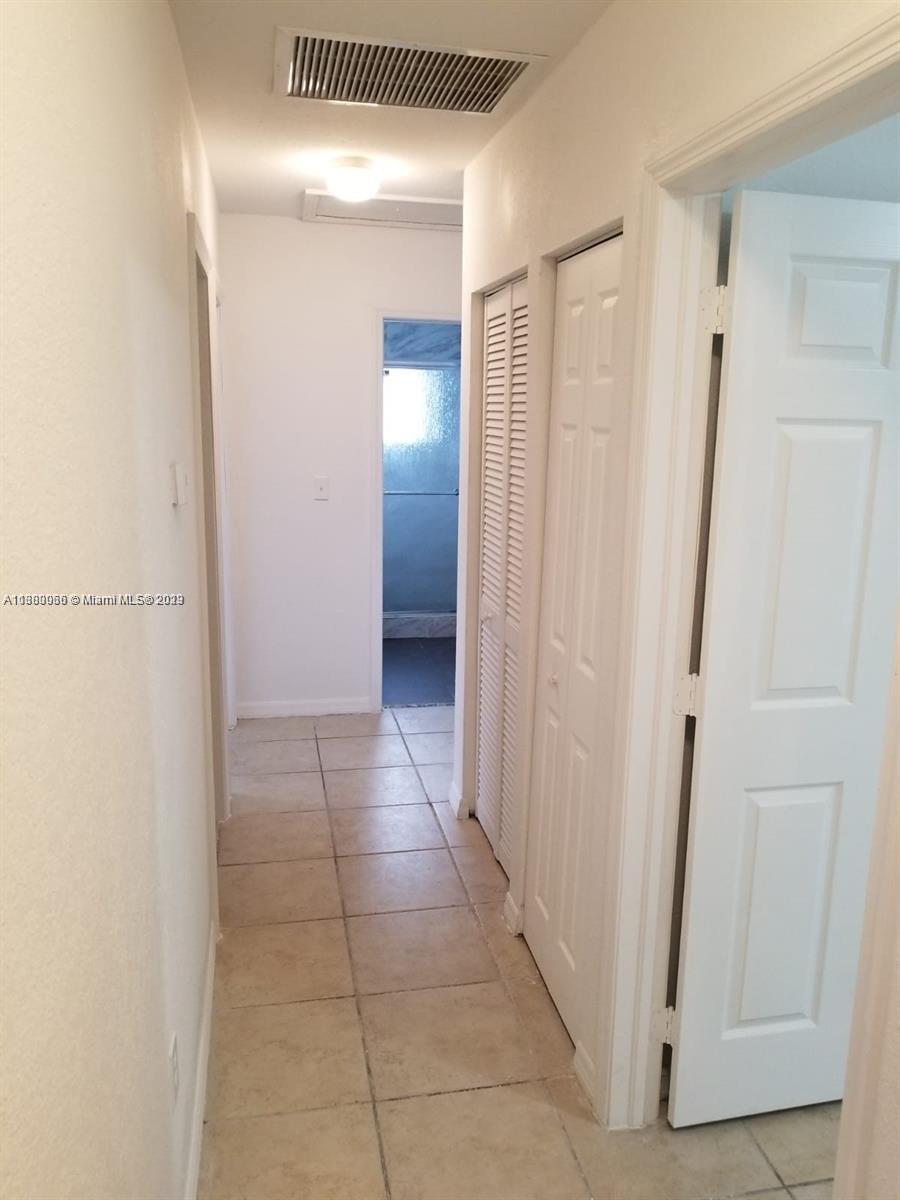 13622 Southwest 285th Terrace Homestead, FL 33033 - Photo 13 of 28 a view of a hallway