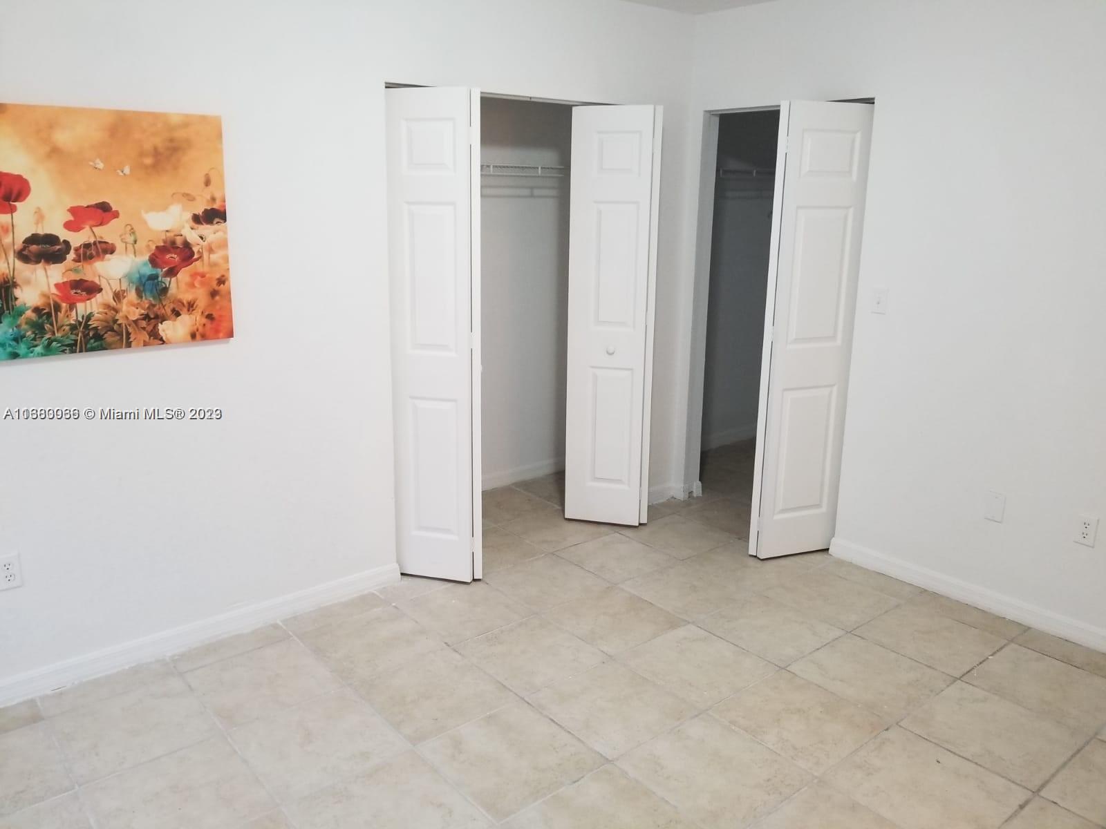 13622 Southwest 285th Terrace Homestead, FL 33033 - Photo 19 of 28 an empty room with closet