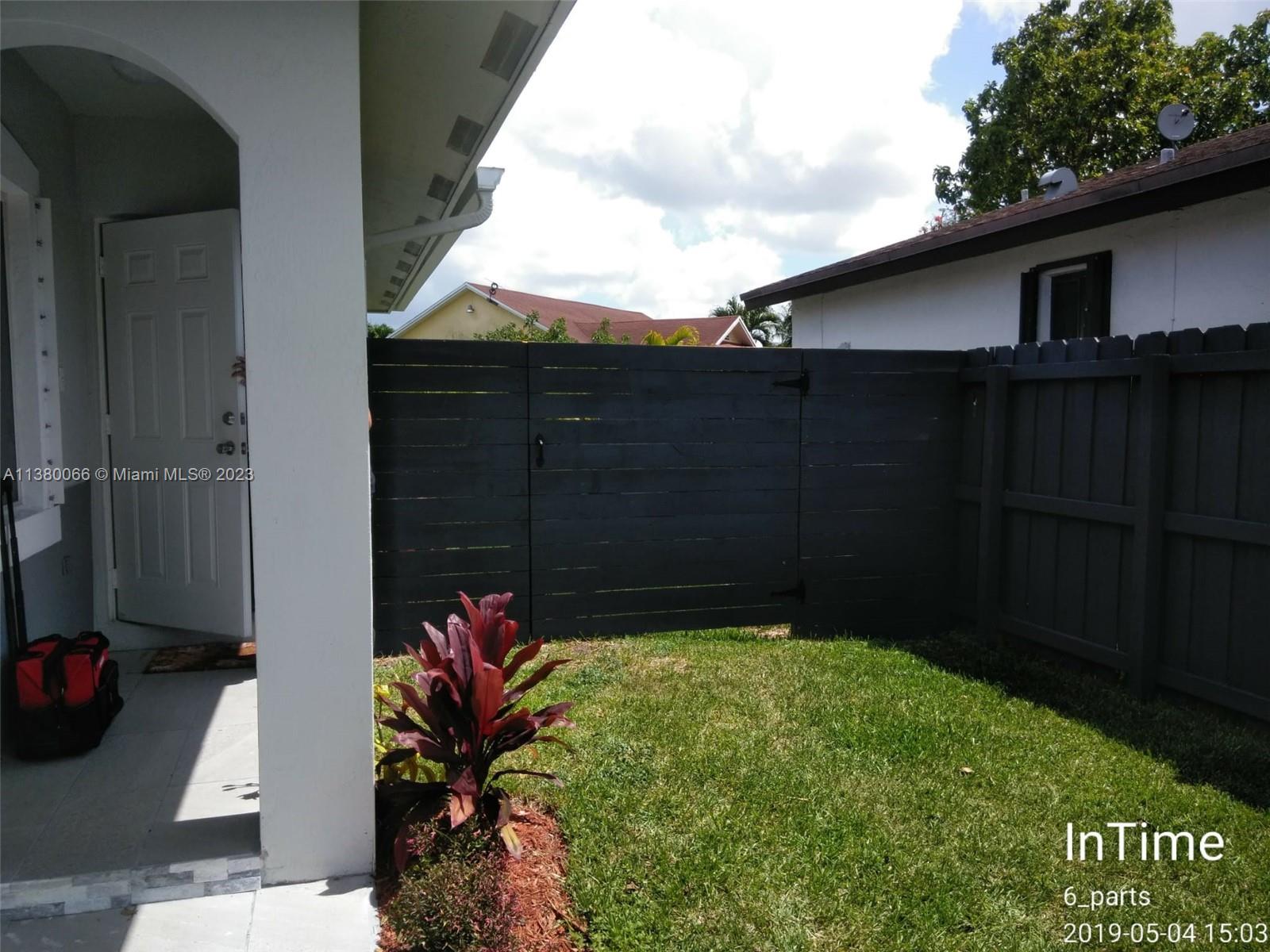 13622 Southwest 285th Terrace Homestead, FL 33033 - Photo 2 of 28 a backyard of a house