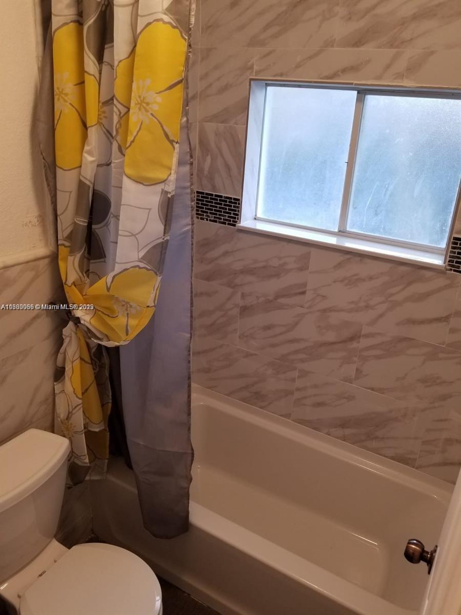 13622 Southwest 285th Terrace Homestead, FL 33033 - Photo 22 of 28 a bathroom with a toilet and a shower