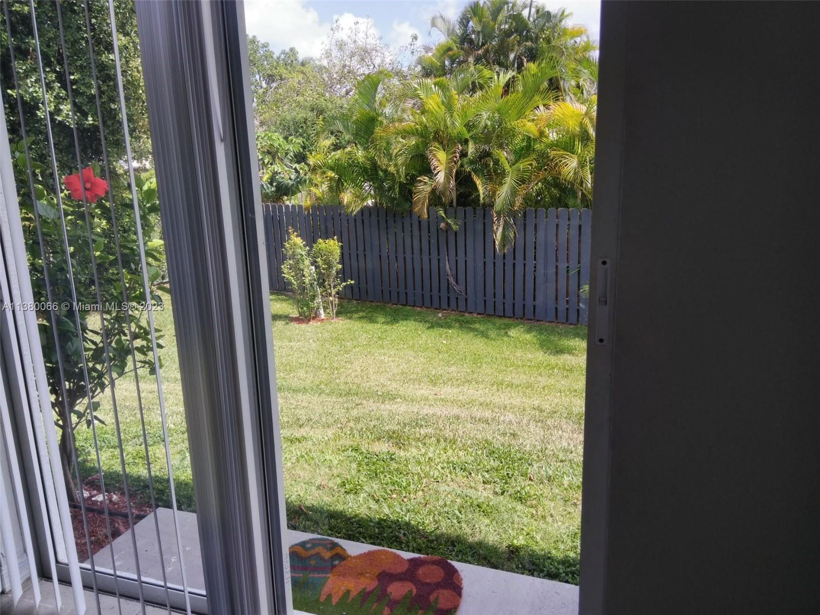 13622 Southwest 285th Terrace Homestead, FL 33033 - Photo 27 of 28 a view of a yard from a balcony