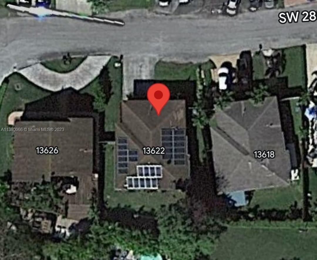 13622 Southwest 285th Terrace Homestead, FL 33033 - Photo 5 of 28 an aerial view of balcony with outdoor space