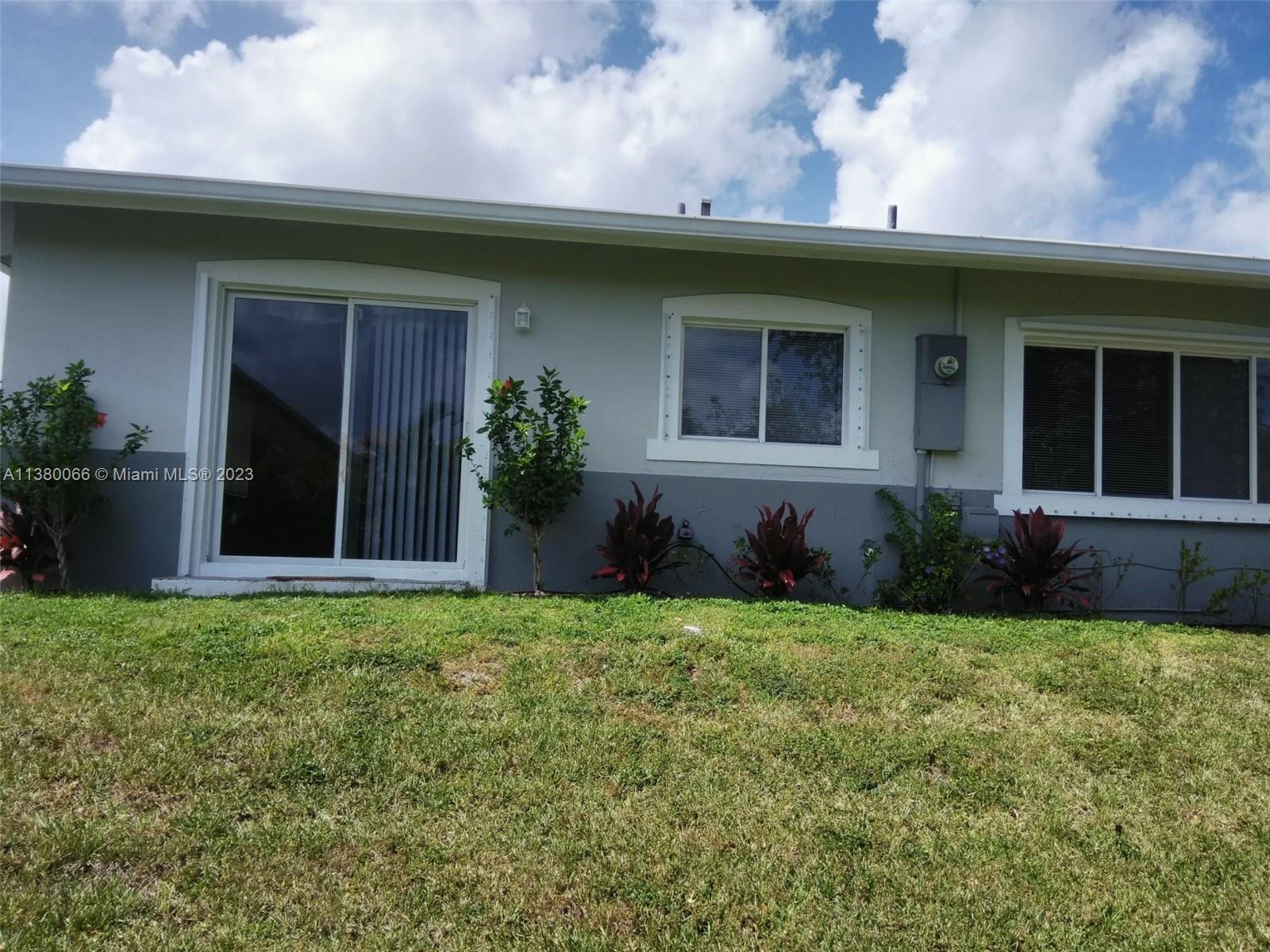 13622 Southwest 285th Terrace Homestead, FL 33033 - Photo 7 of 28 a view of a house with backyard and porch