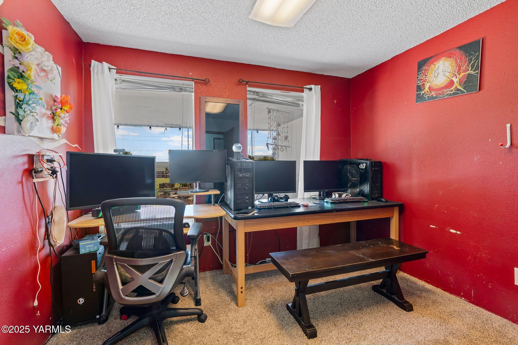 1620 Selah Loop Road Selah, WA 98942 - Photo 26 of 33 a work room with furniture and wooden floor
