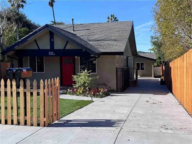 a front view of a house with a porch