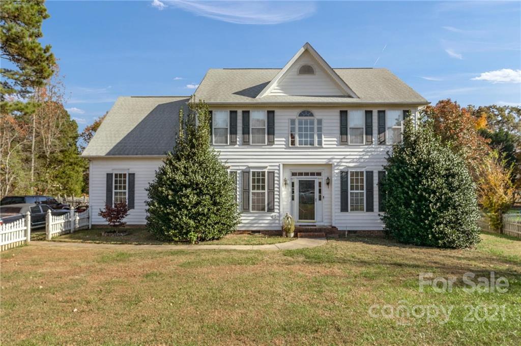 3800 Ruth Street Indian Trail, NC 28079 - Photo 1 of 34 a front view of a house with a yard