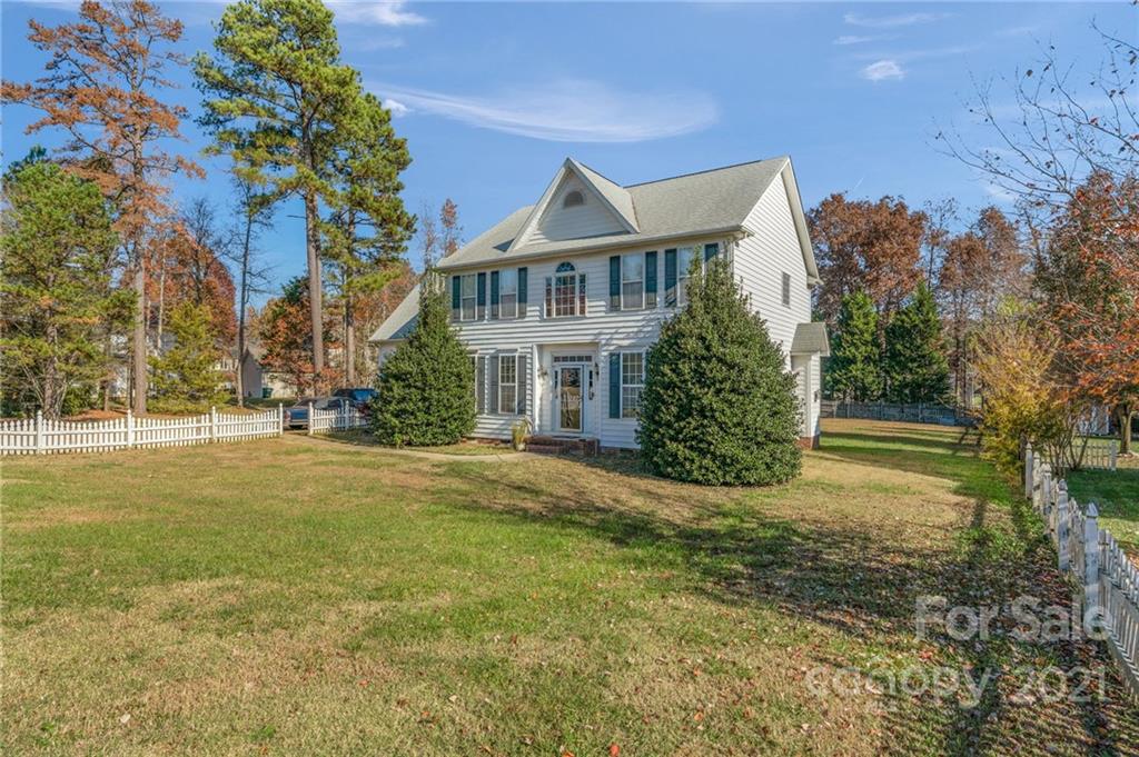 3800 Ruth Street Indian Trail, NC 28079 - Photo 2 of 34 a front view of a house with a garden
