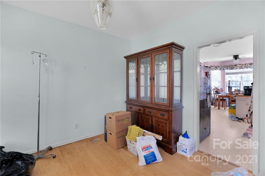 3800 Ruth Street Indian Trail, NC 28079 - Photo 12 of 34 a bedroom with a bed and wooden floor